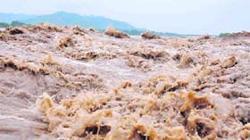 A river in spate that washed away roads and bridges during the Uttarakhand disaster