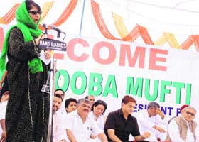 PDP president Mehbooba Mufti addresses party workers in Ranjan Jandyal village on the outskirts of Jammu on Sunday