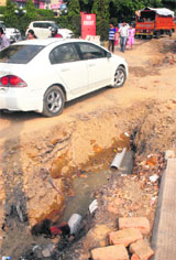  The work of laying water pipeline near BMC chowk is progressing at a snails pace. Open pits pose a threat to the commuters.