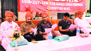 Members of the Zorawar Singh Memorial Committee, Reasi, felicitate Balwant Thakur (second from left) in Reasi on Sunday. 