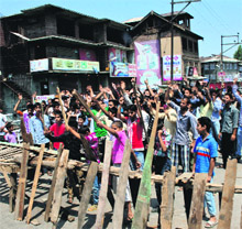 Residents protest against the death of a local youth in the Nawab Bazar area of downtown Srinagar on Sunday. 