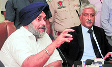 Deputy Chief Minister Sukhbir Badal at a press meet in Kharar on Sunday. State police chief SS Saini is seated next to him