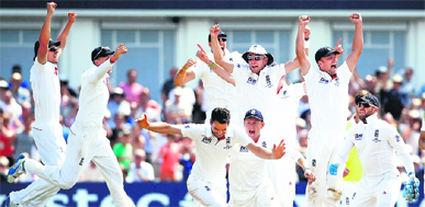 England celebrate as Brad Haddin is given caught-behind by the third umpire.