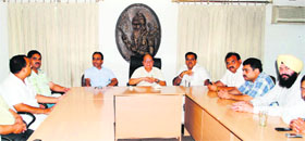 Mayor Bakshi Ram Arora holds a meeting with BJP coucillors and leaders in Amritsar on Monday. 