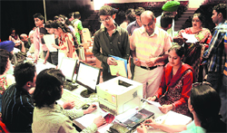 Students show their documents for admission at Panjab University on Monday. Tribune photo: Pradeep Tewari 