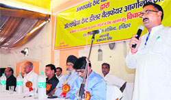 All India Tent Dealers Welfare Organisation members discuss ways to assist the people affected by the natural calamity in Haridwar on Monday. Tribune photo: Rameshwar Gaur