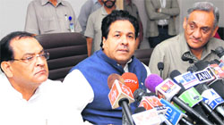 Union Minister for Planning and Parliamentary Affairs Rajeev Shukla along with Uttarakhand Chief Minister Vijay Bahuguna and Disaster Management Minister Yashpal Arya addresses mediapersons in Dehradun on Monday. Tribune photo: Vinod Pundir