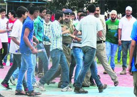 Students have a heated discussion with policemen at Vallabh Government College in Mandi on Monday
