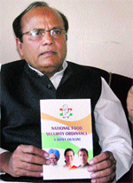 Congress leader Meem Afzal launches a publication on "National Food Security Ordinance" in Srinagar on Monday.