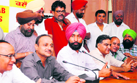 Congress leaders during a press conference in Jalandhar on Monday.
