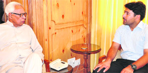 Havildar Rafiq Ahmad Malik during a meeting with Governor NN Vohra in Srinagar on Monday. 