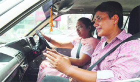 Neelam Rana (right) gives driving lessons in Ludhiana.