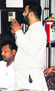 A pistol kept in the case tied to the bottom left of SAD councillor Pawan Khazuris dress during the MC House meeting held in Amritsar.