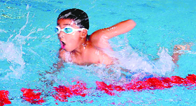 A participant in action during the State Swimming Competition at the All-Weather Swimming Pool in Sector 23, Chandigarh, on Tuesday.