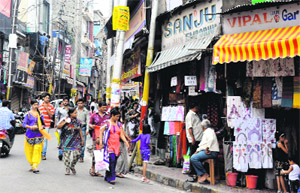 Residents throng ancient Raghunath Bazaar in Jammu on Tuesday. 