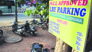 A board installed at a parking site along Ferozepur Road in Ludhiana. 