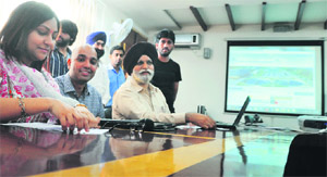 Mayor Harcharan Singh Gohalwaria and senior MC officials during the launch of the new MC website in Ludhiana on Tuesday. 