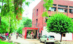 Parts of the entrance to the Sri Guru Teg Bahadur Nagar where the Amritsar rural police has come up with encroachments in Amritsar