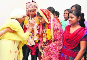 Geeta, an inmate of the Nari Niketan, and her husband Rajesh Kumar being blessed by a senior citizen after their wedding at an old-age home in Sector 43, Chandigarh, on Wednesday