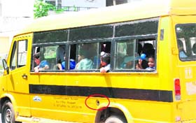 A school bus without safety grills and an uncovered fuel tank inlet at Panchkula on Tuesday
