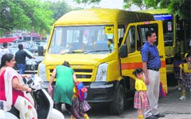 A bus of St Soldier’s School, Phase VII, Mohali, plies with school’s name not painted on it