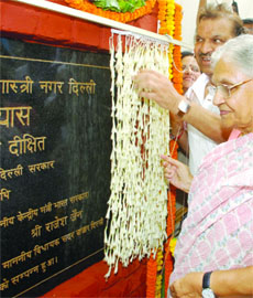 Chief Minister Sheila Dikshit laying the foundation stone of a school building at Shastri Nagar in Delhi on Wednesday. 