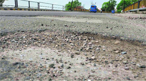 A road in a dilapidated state in Haridwar on Wednesday. 