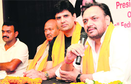 Avadhesh Chaudhary, newly elected president of the All India Volleyball Federation, talks to mediapersons in Dehradun on Tuesday.