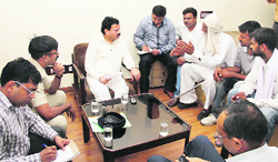Raj Kumar Verka, Vice-Chairman of the National Commission for Scheduled Castes, interacts with people in Hisar on Wednesday. Tribune photo