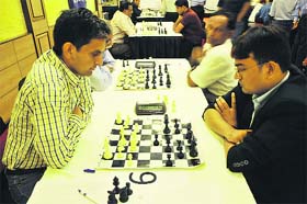 Players during the three-day Inter-Regional PowerGrid Chess Tournament 2013 in Jammu on Wednesday