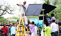 Prakash Jha (in white) with the crew of Satyagraha