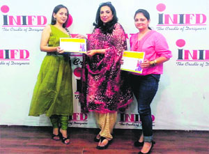 The two INIFD students, whose collection has been selected to be showcased at Lakme Fashion Week, in Amritsar. 