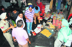 Health Department officials during a raid in Amritsar. 