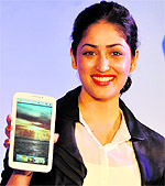 Bollywood actress Yami Gautam displays Samsung Galaxy Tab 3 at its launch in New Delhi on Thursday