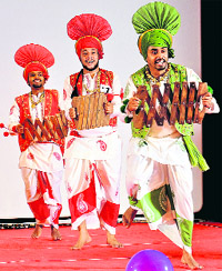 Students perform bhangra during a function organised to celebrate the ninth Foundation Day of the Adesh Institute of Medical Sciences and Research in Bathinda on Thursday.