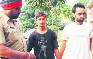 The accused in police custody in Mohali on Thursday. 