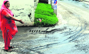 Sewage flows on to Randhawa Road in Kharar. 