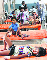 Schoolchildren being treated at the Patna Medical College & Hospital