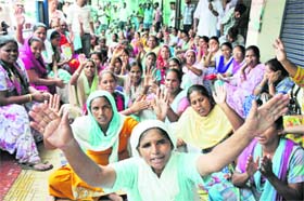 JMC sanitation workers protest in Jammu on Thursday