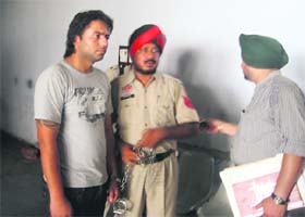 Gur Arpan (left) being presented before a court in Ludhiana on Thursday