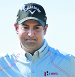 Shiv Kapur gestures after making his birdie putt on the sixth green during the first round of the British Open at Muirfield on Thursday.  Reuters