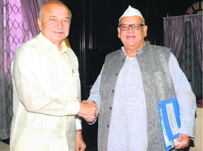 Governor Aziz Qureshi meets Union Home Minister Sushil Kumar Shinde in New Delhi on Friday. 