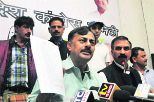 Prem Chandra Mishra addresses mediapersons in Shimla on Friday. 
