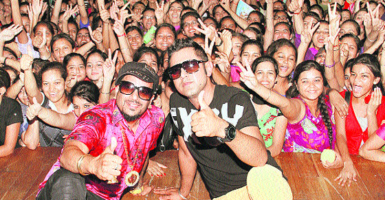 Famous Punjabi singers Jazzy B and Gippy Grewal with KMV College students during a promotional programme of their upcoming Punjabi movie Best of Luck in Jalandhar on Friday
