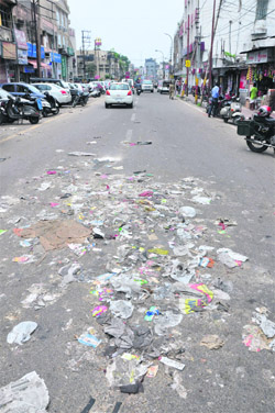Jammu city virtually turned into a garbage dump as sanitation workers continued their strike for the second day on Friday. 
