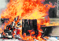 Furniture of the newspaper office set on fire in Ludhiana on Friday. Photo: Inderjeet Verma 