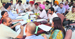The finance and contracts committee meeting in progress at the Mayors camp offfice in Ludhiana on Friday. Photo: Inderjeet Verma