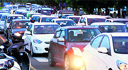 The family of Geetanjali, who was found shot dead in Gurgaon, seeks justice; and (right) vehicles stuck in a traffic jam due to the protest at the Sector 5/6/7/8 roundabout in Panchkula on Saturday