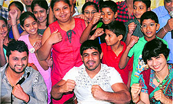 Wrestler Sushil Kumar with young kick boxers during a function in Chandigarh on Saturday