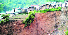 Land eroded alarmingly close to Chamasari village in Thatyur.